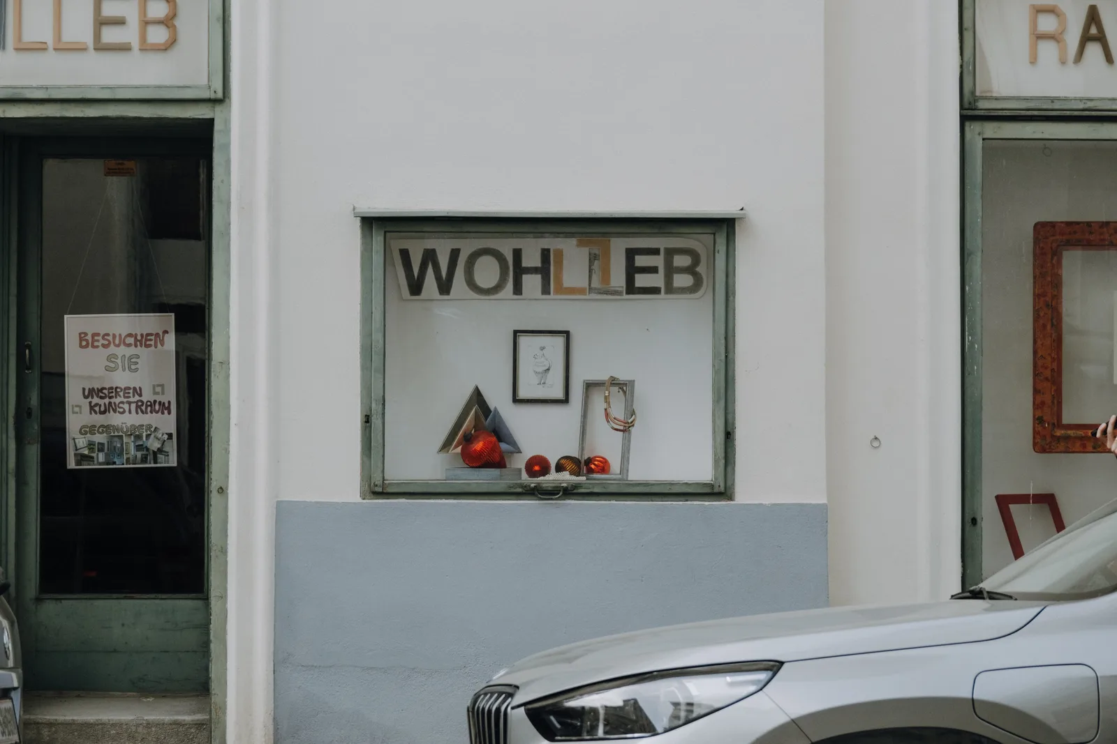 A minimalist street view of the Wohleb store display in Vienna, Austria.